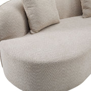 Elegant Noble House curved sectional sofa with full foam cushions, showcasing plush seating and stylish design in a modern living room.