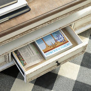 Realyn - Lift Top Cocktail Table - White / Brown - R&R Furniture Gallery (Fountain Valley, CA)