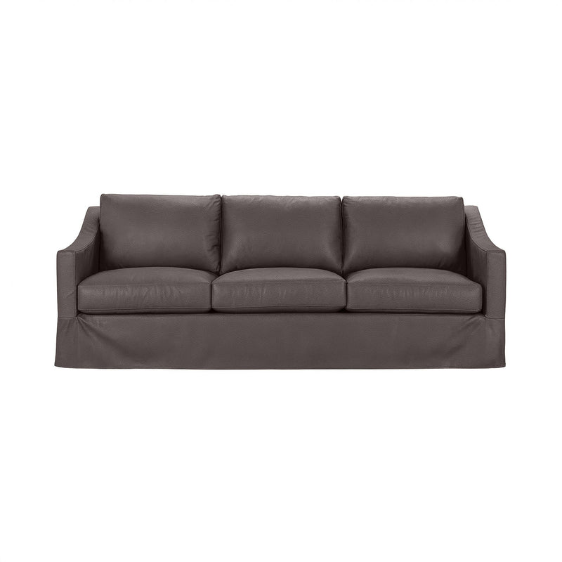 Classic Home Kipton upholstered stationary sofa with plush cushions and elegant fabric upholstery in a cozy living room setting.