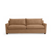 Classic Home Olivia stationary sofa with plush fabric upholstery and elegant design, featuring comfortable seating and classic style.