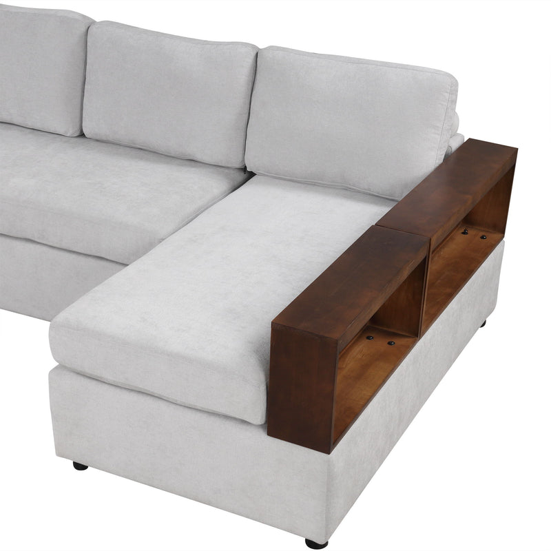Noble House stationary sectional sofa with upholstered cushions and reversible armrests in a modern living room setting.