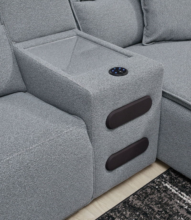 Signature Design by Ashley Modmax II reclining sectional in salt and pepper fabric, with plush cushions and wide armrests.