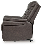 Signature Design by Ashley Oatman Power Lift Recliner in neutral fabric, featuring plush cushioning and a sturdy lift mechanism.