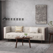Contemporary Noble House 3-seater sofa with mid-century charm, button tufted waffle stitching, and plush stationary design.