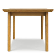 Simpli-Home Draper rectangular dining table with wooden top and sturdy legs, ideal for modern dining rooms.