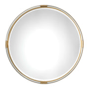 Gold round wall mirror by Uttermost featuring a sleek, modern design with a thin metal frame for contemporary decor.