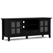 Simpli-Home Acadian TV media stand with open shelves and storage compartments, made of wood with a natural finish.