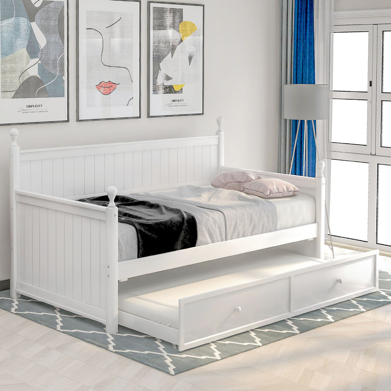 White twin size daybed with built-in trundle bed from DreamHaus, featuring a sleek design suitable for versatile bedroom decor.