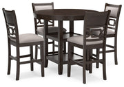 Signature Design by Ashley Langwest 5-piece brown dining room counter table set with matching chairs.