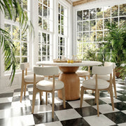 TOV Furniture Nikita dining side chair with a modern design, featuring a sleek wooden frame and upholstered seat.