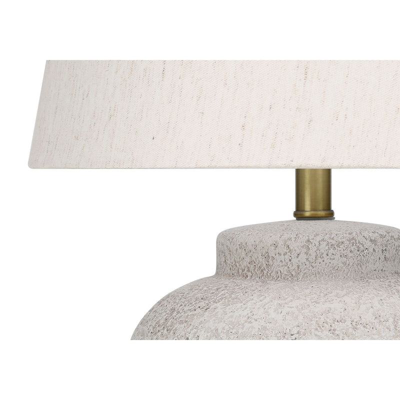 Modern concrete table lamp in cream color by 8th Street, featuring a sleek, minimalist design suitable for contemporary interiors.