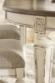 Realyn - Oval Dining Room Extension Table - Chipped White - R&R Furniture Gallery (Fountain Valley, CA)