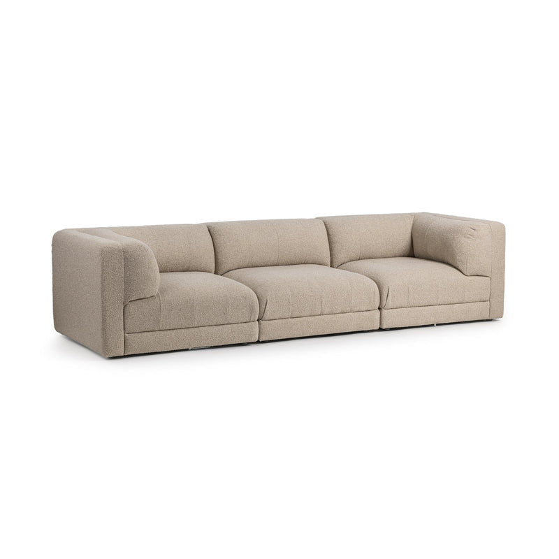 Classic Home Adalynne stationary sectional sofa with plush cushions and modern design in a living room setting.
