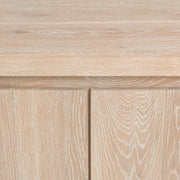 Classic Home Bristol 4-door buffet cabinet with wood finish, featuring sleek doors and ample storage space.