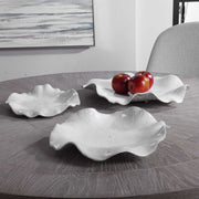 Set of three Abella ceramic wall decor pieces by Uttermost featuring modern, textured designs for stylish interior accents.