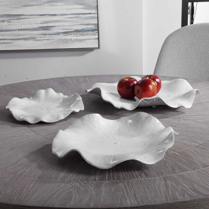 Set of three Abella ceramic wall decor pieces by Uttermost featuring modern, textured designs for stylish interior accents.
