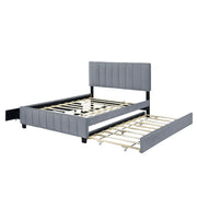 DreamHaus platform upholstered storage bed with two drawers and twin long trundle, featuring a modern design and soft fabric upholstery.