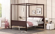 DreamHaus canopy platform bed with headboard, footboard, and slat support legs, showcasing a sturdy wooden frame and elegant design.