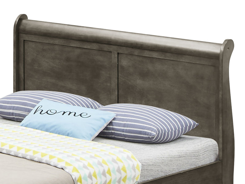 Elegant Glory Furniture trundle bed with a classic design, featuring a wooden frame and a hidden pull-out sleeping drawer.