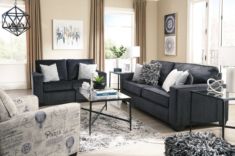 Signature Design by Ashley Altari sleeper sofa with gray fabric, plush cushions, and convertible design for versatile seating and sleeping space.