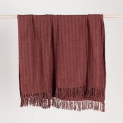 Hunter throw blanket by Classic Home, soft and cozy fabric with a stylish pattern, shown draped over a sofa.