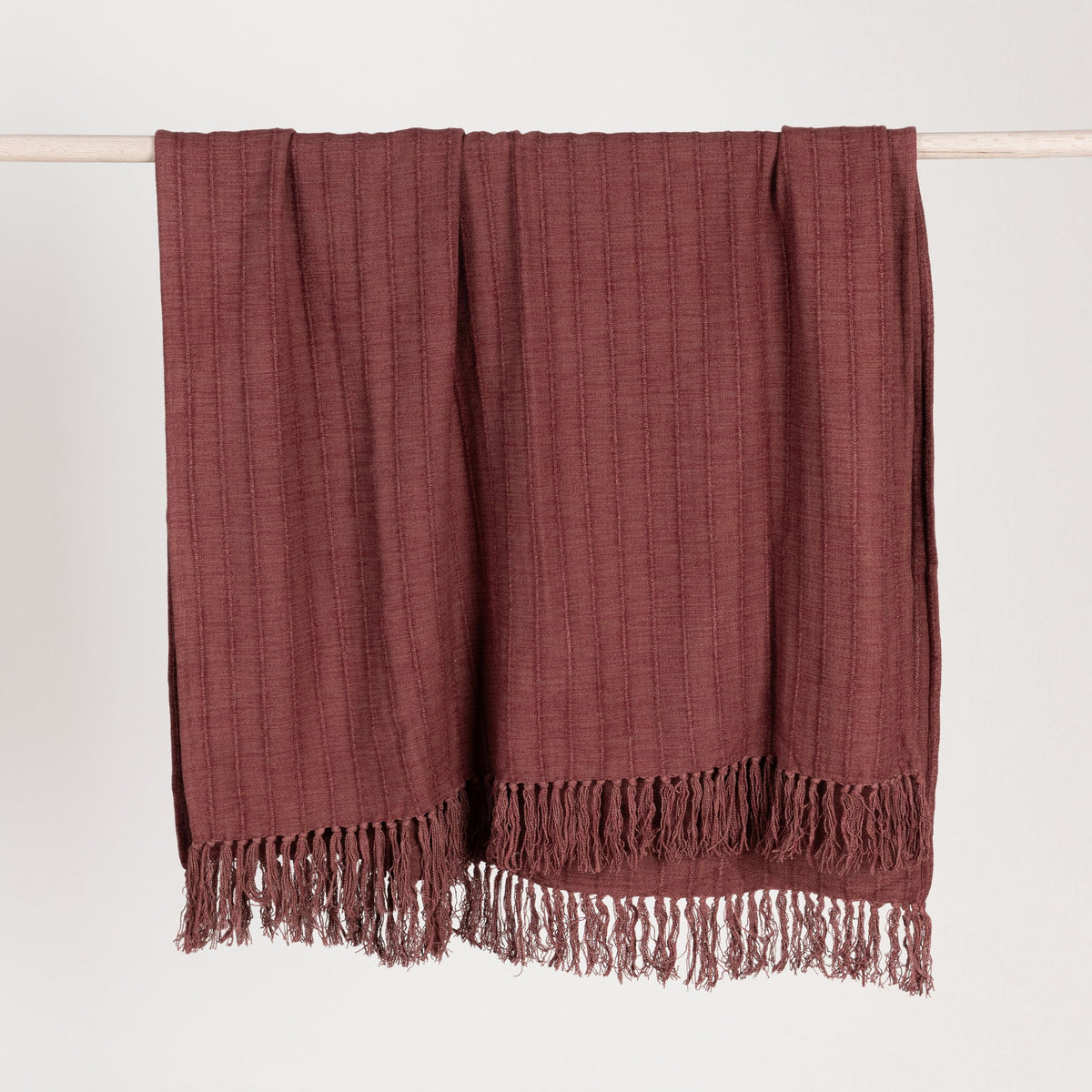 Hunter throw blanket by Classic Home, soft and cozy fabric with a stylish pattern, shown draped over a sofa.