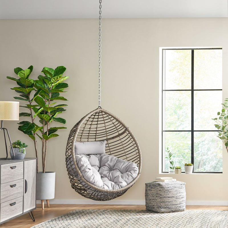 Noble House Morris Teardrop hanging chair with chain and water-resistant cushions, designed for outdoor relaxation and comfort.