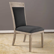 Uttermost Encore armless side chair in dark gray fabric with sleek modern design and wooden legs.