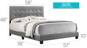 Upholstered Caldwell bed by Glory Furniture with a padded headboard and modern design in a cozy bedroom setting.
