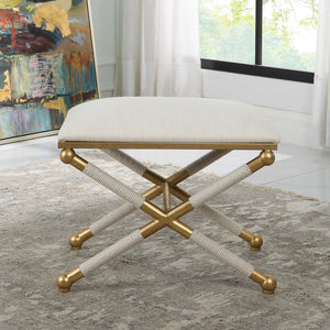 Uttermost Socialite small beige accent bench with cushioned top and wooden legs, ideal for entryways or living spaces.