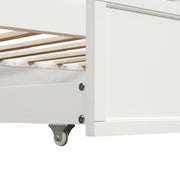 White twin size daybed with attached trundle bed from DreamHaus, showcasing a sleek, modern design with clean lines and cozy bedding.