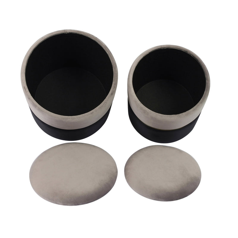 Pair of TOV Furniture Gigi storage ottomans in neutral fabric with wooden legs, showcasing their versatile, compact design.