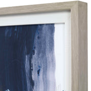 Abstract blue framed print by Uttermost, showcasing modern artwork with a sleek black frame.
