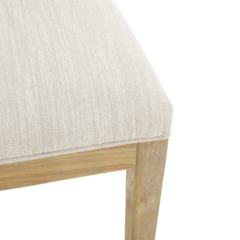 Noble House farmhouse style fabric upholstered side dining chairs set with cushioned seats and wooden legs.