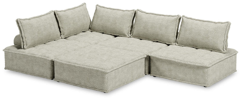 Signature Design by Ashley stationary sectional sofa with plush cushions and modern design, perfect for living room seating.