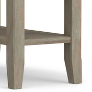 Handcrafted Acadian Narrow Side Table by Simpli-Home, featuring a sleek wooden design with a single shelf and sturdy legs.