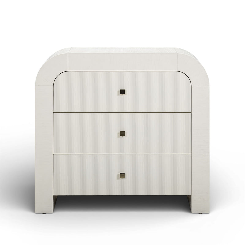 TOV Furniture Hump bedside chest with wooden finish and modern design, featuring a single drawer and compact storage space.