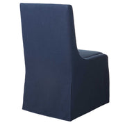 Uttermost Coley armless side chair with plush upholstered seat and sleek wooden legs, modern design for living room or office.