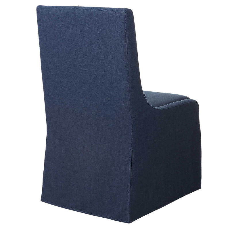 Uttermost Coley armless side chair with plush upholstered seat and sleek wooden legs, modern design for living room or office.