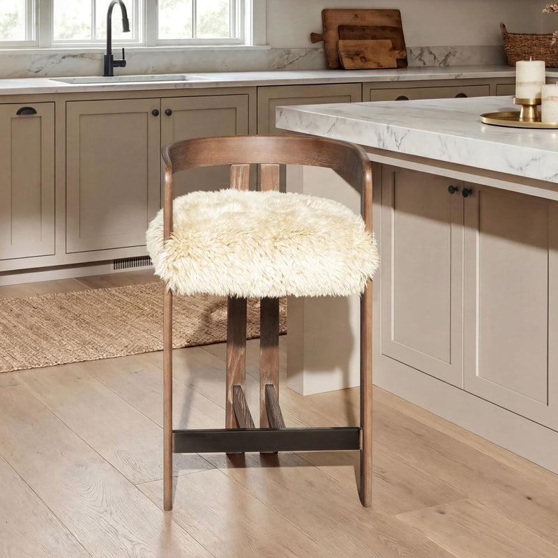 Jennifer Taylor Home Millwick low back counter stool with wood legs and upholstered seat, suitable for kitchen or bar area.