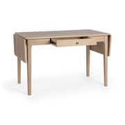 Classic Home Karl extendable coastal drift writing desk with sleek wood finish and adjustable surface for versatile workspace.