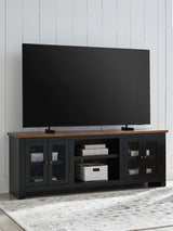 Wildenauer - XL TV Stand With Fireplace Option - Brown / Black - R&R Furniture Gallery (Fountain Valley, CA)