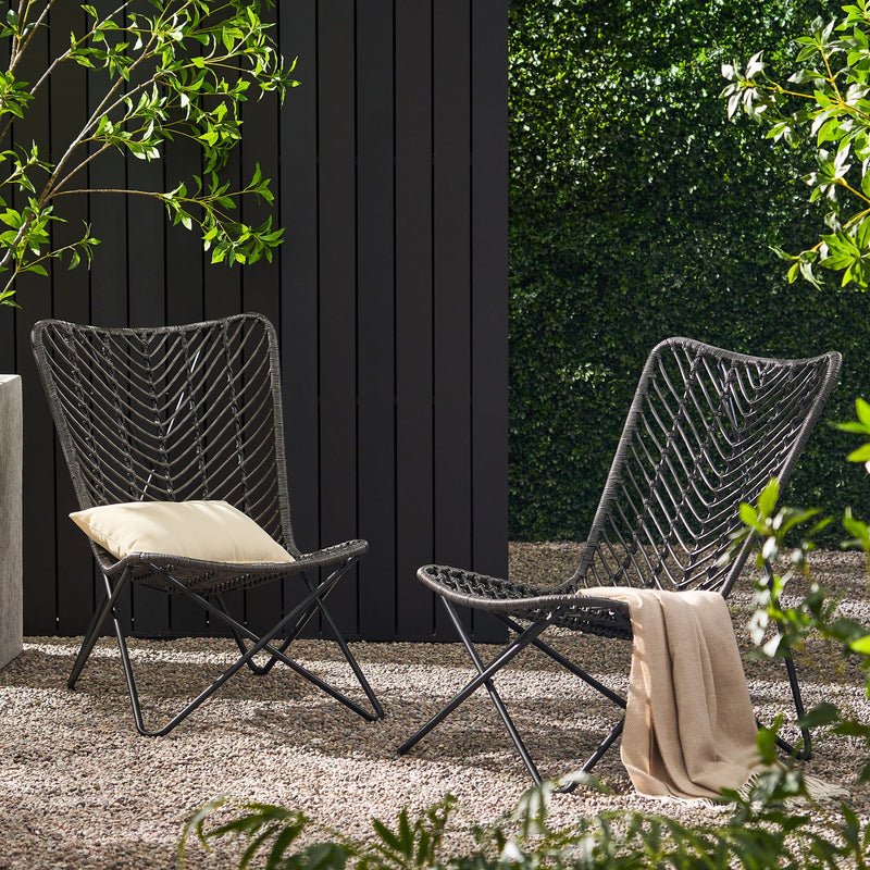 Set of two gray outdoor wicker chairs with geometric cross metal bases by Noble House, ideal for patio or garden seating.
