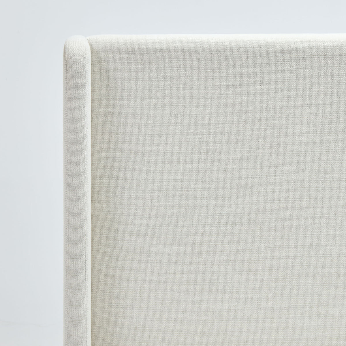 Caron ivory king size upholstered wingback bed with high headboard by House & Home Furniture