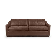 Classic Home Aspen stationary sofa with plush cushions and elegant design, perfect for a stylish living room setting.