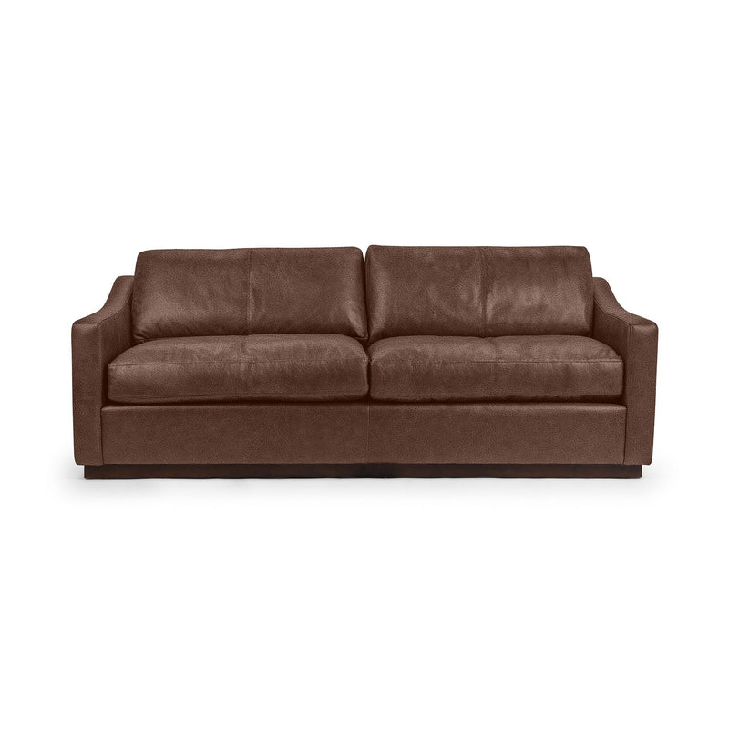 Classic Home Aspen stationary sofa with plush cushions and elegant design, perfect for a stylish living room setting.