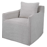 Gray Welland swivel chair by Uttermost featuring a modern design with a cushioned seat and backrest on a rotating base.