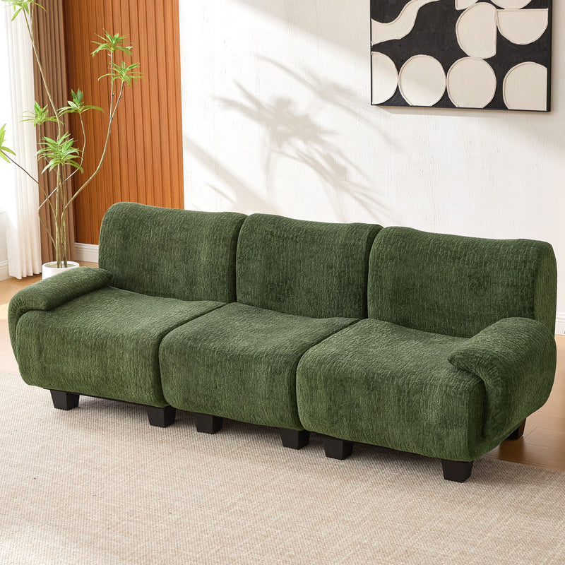 Noble House 3-seater sofa with curved armrests, stationary design, upholstered in neutral fabric, with plush cushions.