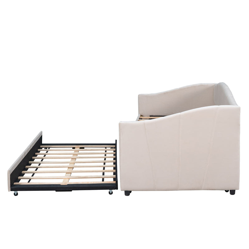 DreamHaus upholstered daybed sofa bed with trundle bed and wood slat frame, showing plush fabric and sturdy construction.