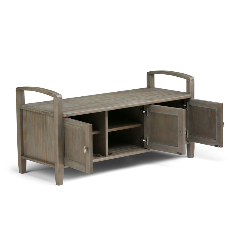 Handcrafted Warm Shaker entryway storage bench by Simpli-Home with wooden finish, featuring a cushioned seat and storage compartments.